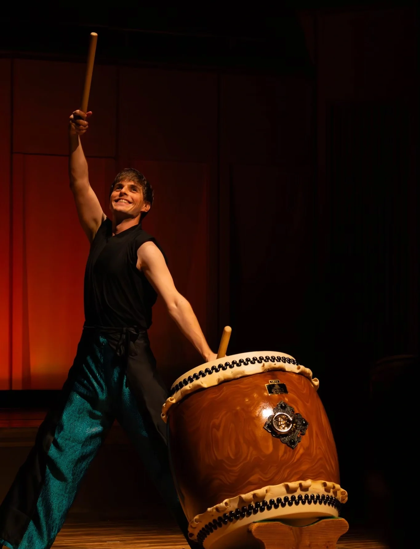 Michaël Tissier performing percussion on stage
